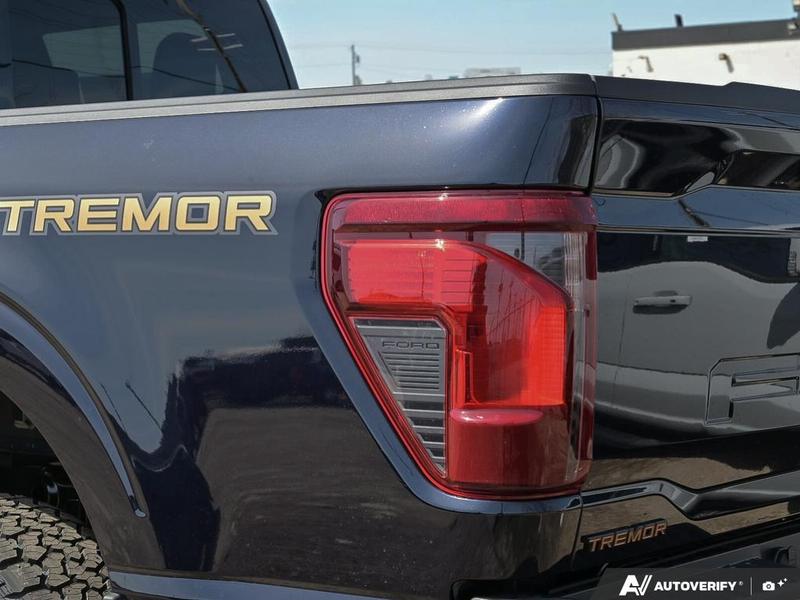NEW 2026 Ford F-150 Tremor - Antimatter Blue Metallic Exterior / BLACK SPORT CLOTH Interior - $83,664 - Stock #E60590 - VIN 1FTFW4L50TFA80893 - Photo 12