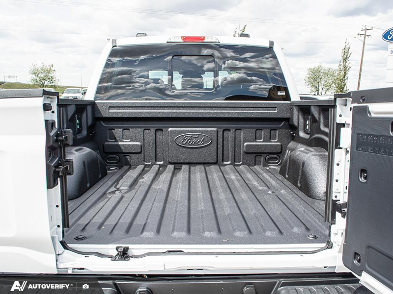 NEW 2026 Ford F-150 LARIAT - Star White Tri-coat Metallic Exterior / BLACK ACTIVE X Interior - $88,957 - Stock #D60573 - VIN 1FTFW5L84TFA96417 - Photo 11