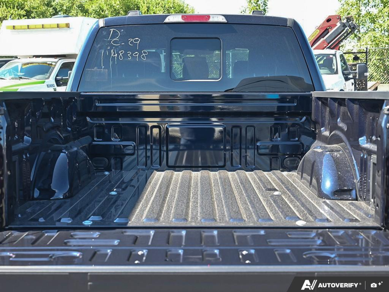 NEW 2026 Ford F-150 LARIAT - Antimatter Blue Metallic Exterior / BLACK ACTIVE X Interior - $79,306 - Stock #E60833 - VIN 1FTFW5L82TFB48398 - Photo 11