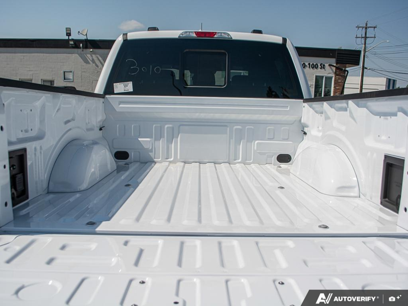 NEW 2026 Ford F-150 Tremor - Oxford White Exterior / BLACK TREMOR LEATHER Interior - $80,949 - Stock #E60955 - VIN 1FTFW4L89TFB68545 - Photo 11