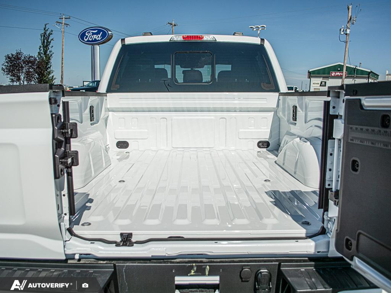 NEW 2026 Ford F-150 LARIAT - Star White Tri-Coat Exterior / BLACK ACTIVE X Interior - $95,489 - Stock #D60781 - VIN 1FTFW5L80TFB61358 - Photo 11