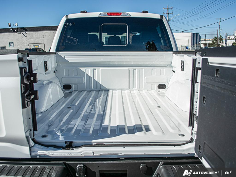 NEW 2026 Ford F-150 LARIAT - Star White Tri-Coat Exterior / BLACK, ACTIVEX TRIMMED 40/CONSOLE/40 FRONT SEATS (B) Interior - $88,660 - Stock #E61044 - VIN 1FTFW5L50TFB69577 - Photo 11