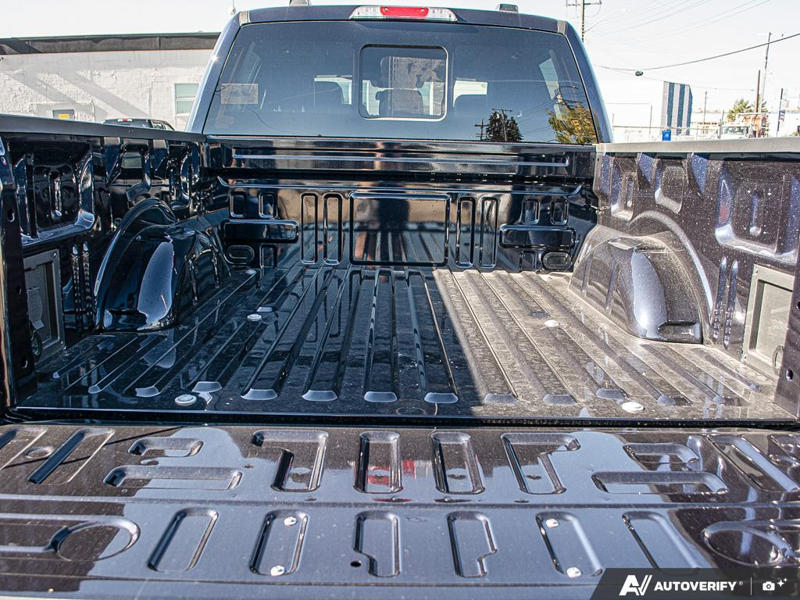 NEW 2026 Ford F-150 LARIAT - Antimatter Blue Metallic Exterior / BLACK, ACTIVEX TRIMMED 40/CONSOLE/40 FRONT SEATS (B) Interior - $81,006 - Stock #E61062 - VIN 1FTFW5L50TFB76593 - Photo 11