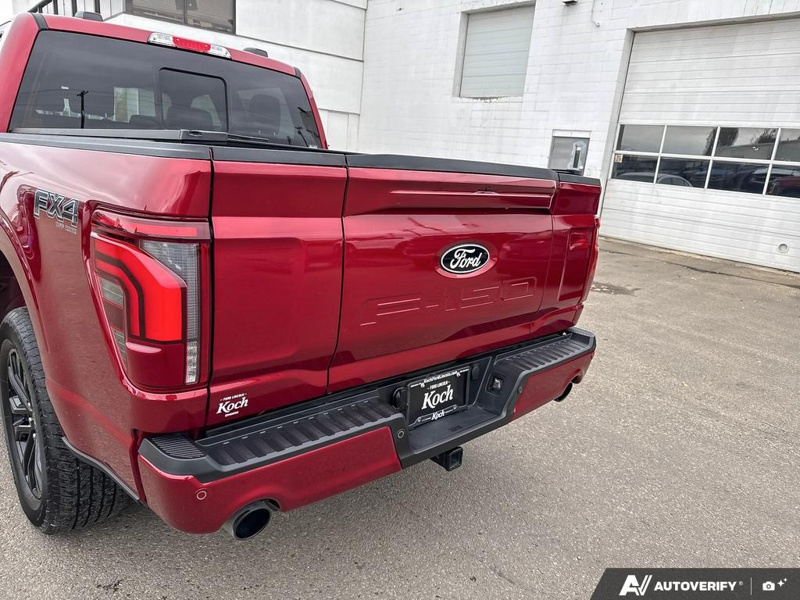 USED 2026 Ford F-150 LARIAT - Ruby Red Metallic Tinted Clearcoat Exterior / BLACK, ACTIVEX TRIMMED 40/CONSOLE/40 FRONT SEATS (B) Interior - $107,190 - Stock #EP4805 - VIN 1FTFW5LD8TFA44785 - Photo 11