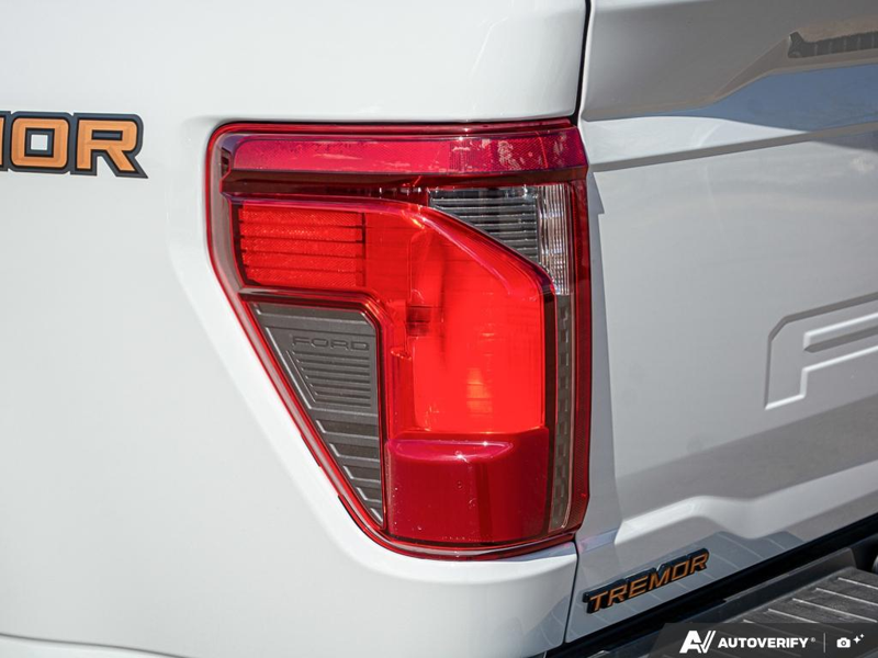 NEW 2026 Ford F-150 Tremor - Avalanche Exterior / BLACK SPORT CLOTH Interior - $78,874 - Stock #E60502 - VIN 1FTFW4L81TFA63515 - Photo 12