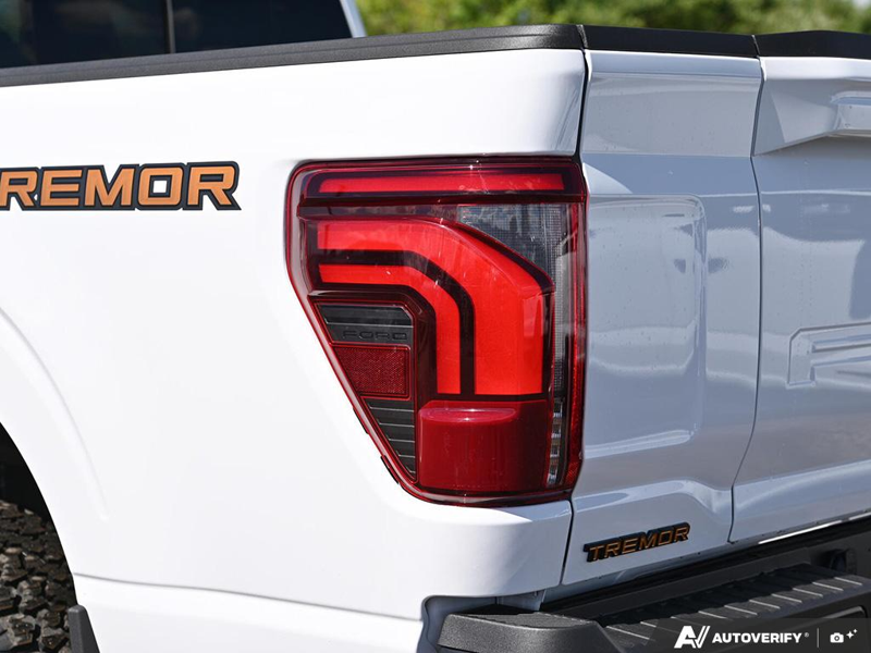 NEW 2026 Ford F-150 Tremor - Oxford White Exterior / BLACK TREMOR LEATHER Interior - $92,969 - Stock #E60746 - VIN 1FTFW4L51TFB13013 - Photo 12