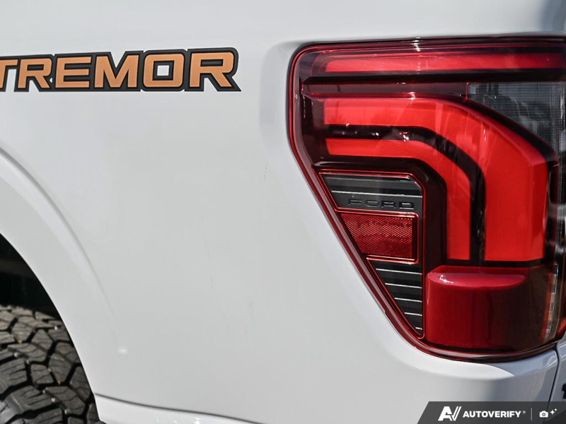 NEW 2026 Ford F-150 Tremor - Oxford White Exterior / BLACK TREMOR LEATHER Interior - $88,579 - Stock #E60980 - VIN 1FTFW4L84TFB68078 - Photo 12