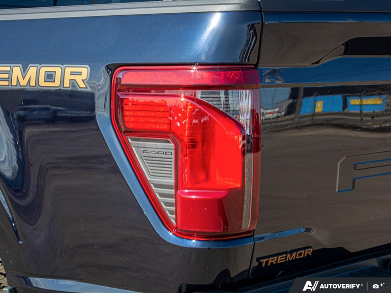 NEW 2026 Ford F-150 Tremor - Antimatter Blue Metallic Exterior / BLACK SPORT CLOTH Interior - $77,637 - Stock #E60541 - VIN 1FTFW4L54TFA70979 - Photo 12