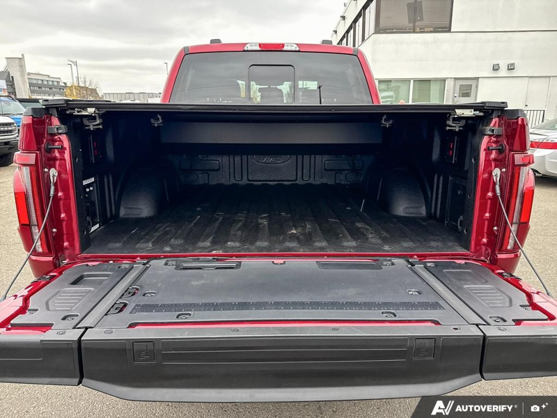 USED 2026 Ford F-150 LARIAT - Ruby Red Metallic Tinted Clearcoat Exterior / BLACK, ACTIVEX TRIMMED 40/CONSOLE/40 FRONT SEATS (B) Interior - $107,190 - Stock #EP4805 - VIN 1FTFW5LD8TFA44785 - Photo 12