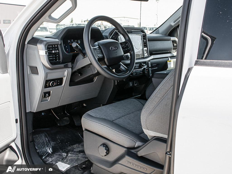 NEW 2026 Ford F-150 XLT - Oxford White Exterior / MEDIUM DARK SLATE CLOTH Interior - $63,902 - Stock #D60588 - VIN 1FTFW3L86TKE30653 - Photo 13