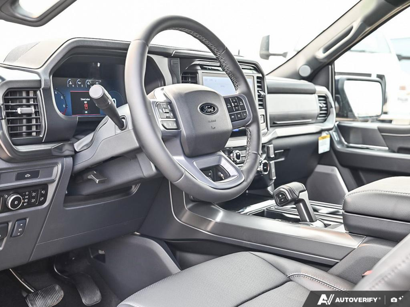 NEW 2026 Ford F-150 LARIAT - Antimatter Blue Metallic Exterior / BLACK ACTIVE X Interior - $86,262 - Stock #E60899 - VIN 1FTFW5L83TFB68837 - Photo 13