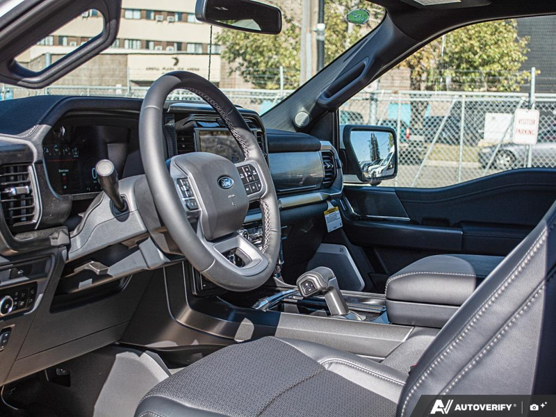 NEW 2026 Ford F-150 LARIAT - Star White Tri-Coat Exterior / BLACK, ACTIVEX TRIMMED 40/CONSOLE/40 FRONT SEATS (B) Interior - $88,660 - Stock #E61044 - VIN 1FTFW5L50TFB69577 - Photo 13