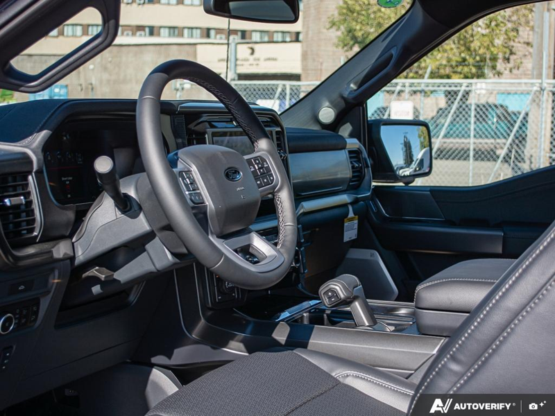 NEW 2026 Ford F-150 LARIAT - Antimatter Blue Metallic Exterior / BLACK, ACTIVEX TRIMMED 40/CONSOLE/40 FRONT SEATS (B) Interior - $87,962 - Stock #E61061 - VIN 1FTFW5L54TFB70859 - Photo 13