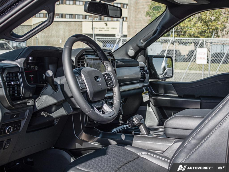 NEW 2026 Ford F-150 LARIAT - Antimatter Blue Metallic Exterior / BLACK, ACTIVEX TRIMMED 40/CONSOLE/40 FRONT SEATS (B) Interior - $81,006 - Stock #E61062 - VIN 1FTFW5L50TFB76593 - Photo 13
