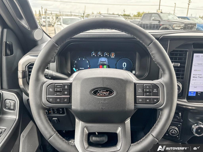 NEW 2026 Ford F-150 LARIAT - Antimatter Blue Metallic Exterior / BLACK ACTIVE X Interior - $86,262 - Stock #E60900 - VIN 1FTFW5L84TFB69768 - Photo 14