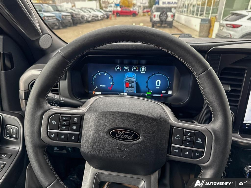 USED 2026 Ford F-150 LARIAT - Ruby Red Metallic Tinted Clearcoat Exterior / BLACK, ACTIVEX TRIMMED 40/CONSOLE/40 FRONT SEATS (B) Interior - $107,190 - Stock #EP4805 - VIN 1FTFW5LD8TFA44785 - Photo 14