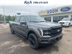 NEW 2026 Ford F-150 LARIAT - Carbonized Grey Metallic Exterior - $84,235 - Stock #A26187 - VIN 1FTFW5L81TKD65772