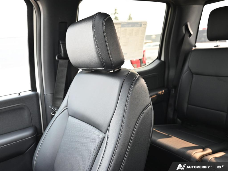 NEW 2026 Ford F-150 LARIAT - Star White Tri-coat Metallic Exterior / BLACK ACTIVE X Interior - $83,411 - Stock #E60856 - VIN 1FTFW5L86TFB49750 - Photo 23