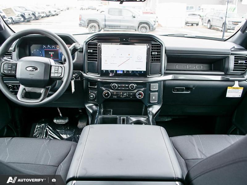 NEW 2026 Ford F-150 STX - Ruby Red Tri-coat Metallic Exterior / BLACK ONYX/BLUE PREM LEATHER SEATS Interior - $59,999 - Stock #D60325 - VIN 1FTEW2LP6TKD58575 - Photo 27