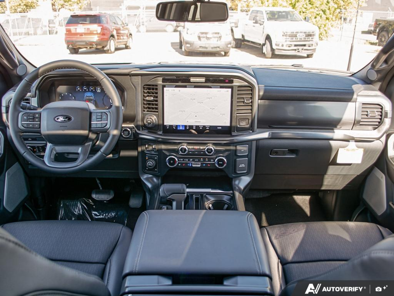 NEW 2026 Ford F-150 LARIAT - Antimatter Blue Metallic Exterior / BLACK, ACTIVEX TRIMMED 40/CONSOLE/40 FRONT SEATS (B) Interior - $87,962 - Stock #E61061 - VIN 1FTFW5L54TFB70859 - Photo 26