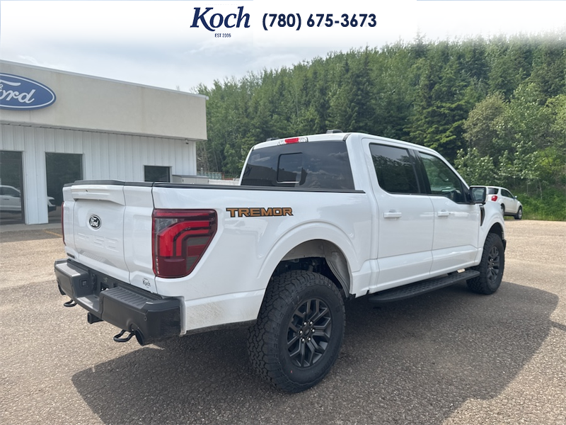 NEW 2026 Ford F-150 Tremor - Oxford White Exterior / BLACK TREMOR LEATHER Interior - $92,020 - Stock #A26213 - VIN 1FTFW4L88TFA60532 - Photo 2