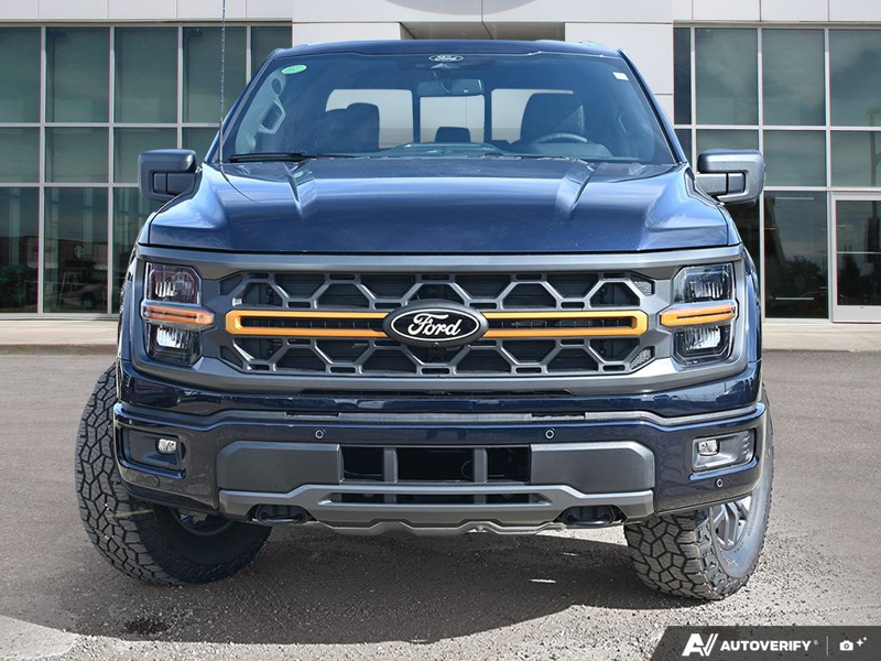 NEW 2026 Ford F-150 Tremor - Antimatter Blue Metallic Exterior / BLACK, UNIQUE SPORT CLOTH 40/CONSOLE/40 POWER FRONT SEAT Interior - $74,949 - Stock #E61089 - VIN 1FTFW4L5XTFC08671 - Photo 2