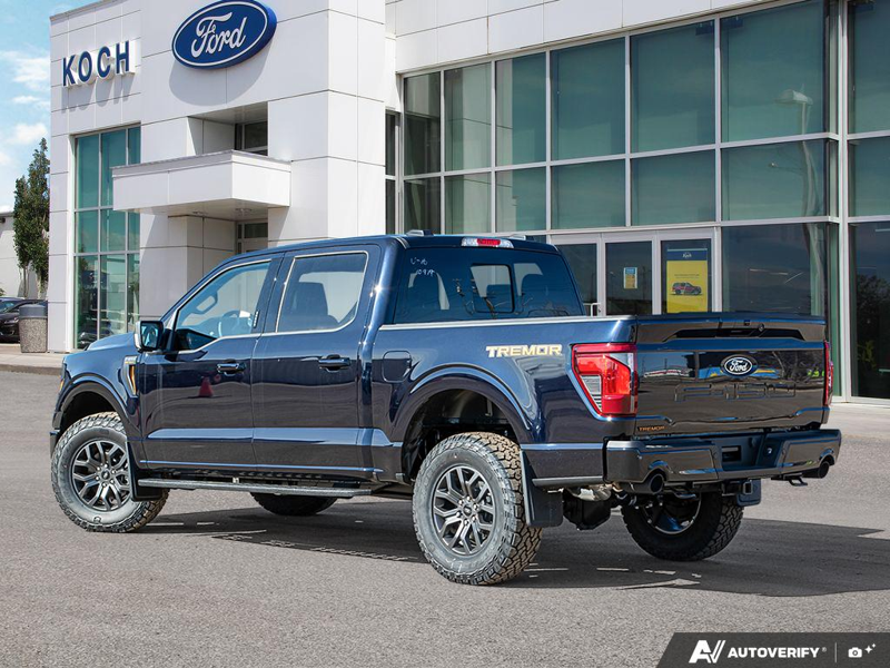 NEW 2026 Ford F-150 Tremor - Antimatter Blue Metallic Exterior / BLACK SPORT CLOTH Interior - $77,637 - Stock #E60541 - VIN 1FTFW4L54TFA70979 - Photo 4