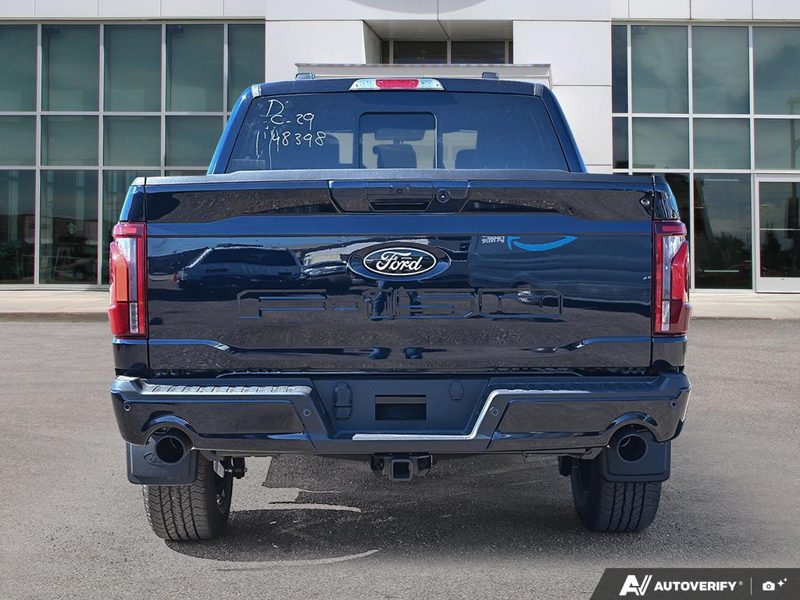 NEW 2026 Ford F-150 LARIAT - Antimatter Blue Metallic Exterior / BLACK ACTIVE X Interior - $79,306 - Stock #E60833 - VIN 1FTFW5L82TFB48398 - Photo 5