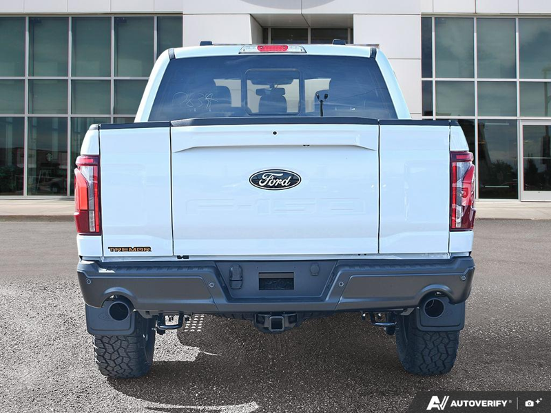 NEW 2026 Ford F-150 Tremor - Oxford White Exterior / BLACK TREMOR LEATHER Interior - $88,579 - Stock #E60980 - VIN 1FTFW4L84TFB68078 - Photo 5