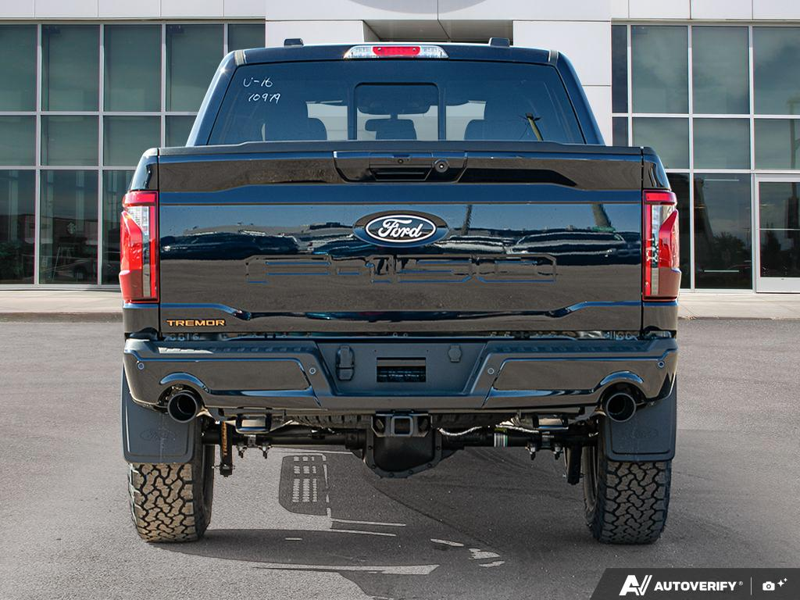 NEW 2026 Ford F-150 Tremor - Antimatter Blue Metallic Exterior / BLACK SPORT CLOTH Interior - $77,637 - Stock #E60541 - VIN 1FTFW4L54TFA70979 - Photo 5