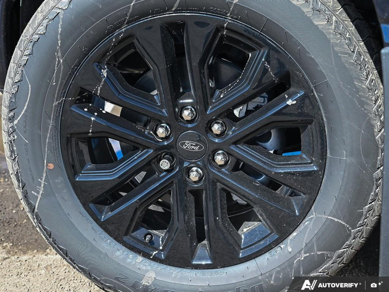 NEW 2026 Ford F-150 LARIAT - Antimatter Blue Metallic Exterior / BLACK ACTIVE X Interior - $79,306 - Stock #E60833 - VIN 1FTFW5L82TFB48398 - Photo 6