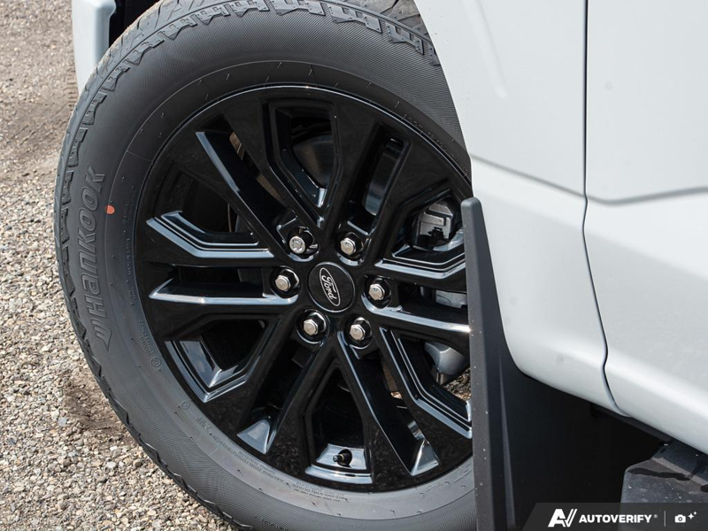 NEW 2026 Ford F-150 LARIAT - Avalanche Exterior / BLACK ACTIVE X Interior - $79,306 - Stock #E60889 - VIN 1FTFW5L81TKE55231 - Photo 6