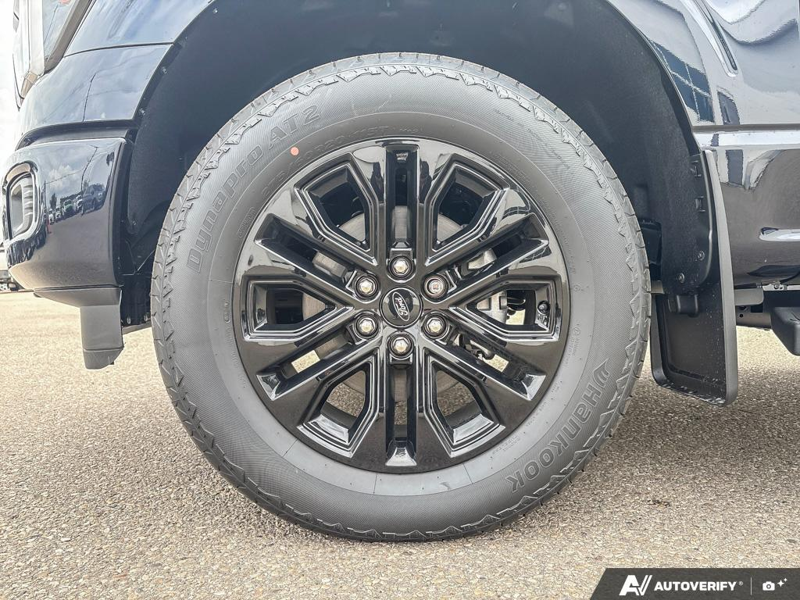 NEW 2026 Ford F-150 LARIAT - Antimatter Blue Metallic Exterior / BLACK ACTIVE X Interior - $82,839 - Stock #E60900 - VIN 1FTFW5L84TFB69768 - Photo 6
