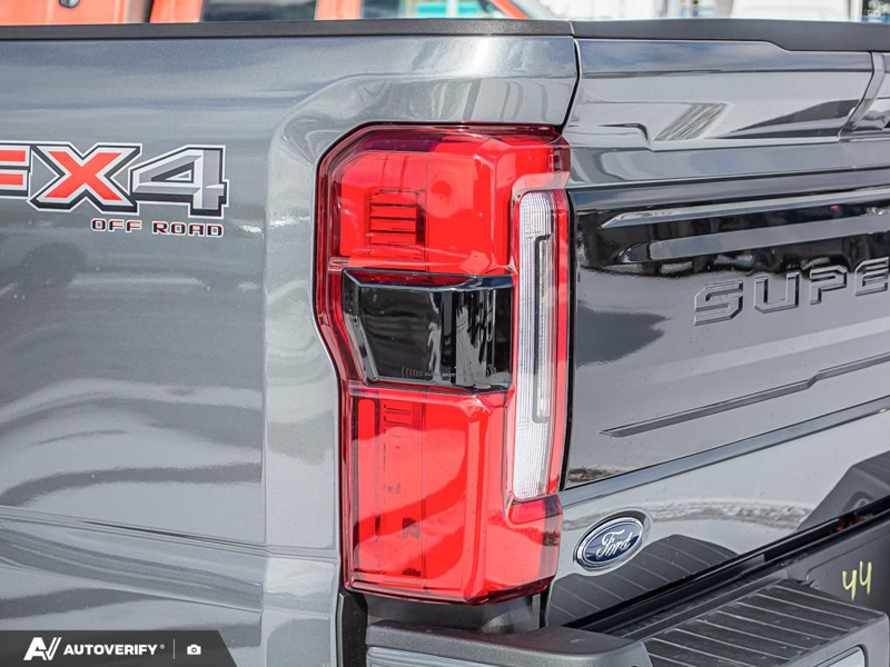 NEW 2026 Ford F-350 Super Duty Platinum - Carbonized Grey Metallic Exterior / BLACK ONYX/BLUE LEATHER Interior - $121,061 - Stock #D60348 - VIN 1FT8W3BT2TEE05424 - Photo 12
