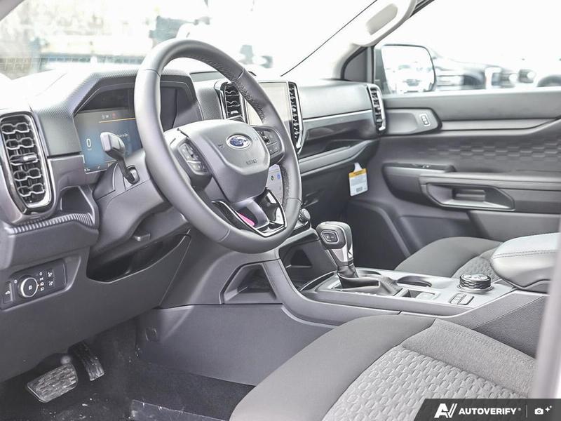 NEW 2026 Ford Ranger XLT - Oxford White Exterior / EBONY PREMIUM CLOTH Interior - $56,869 - Stock #E60297 - VIN 1FTER4HP7TLE04386 - Photo 13