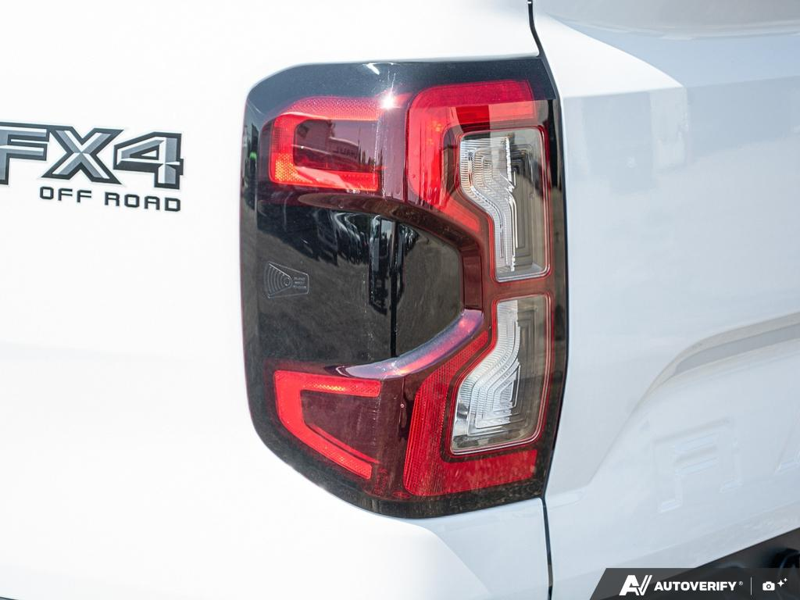 NEW 2026 Ford Ranger XLT - Oxford White Exterior / EBONY PREMIUM CLOTH Interior - $56,913 - Stock #E60309 - VIN 1FTER4HP2TLE04344 - Photo 12