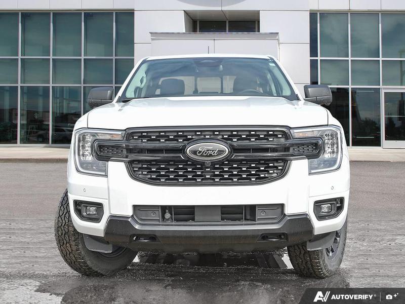 NEW 2026 Ford Ranger XLT - Oxford White Exterior / EBONY PREMIUM CLOTH Interior - $56,869 - Stock #E60297 - VIN 1FTER4HP7TLE04386 - Photo 2