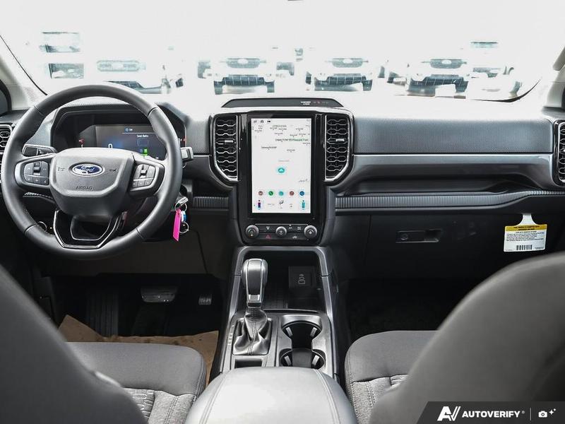 NEW 2026 Ford Ranger XLT - Oxford White Exterior / EBONY PREMIUM CLOTH Interior - $51,819 - Stock #E60294 - VIN 1FTER4HH6TLE04274 - Photo 25
