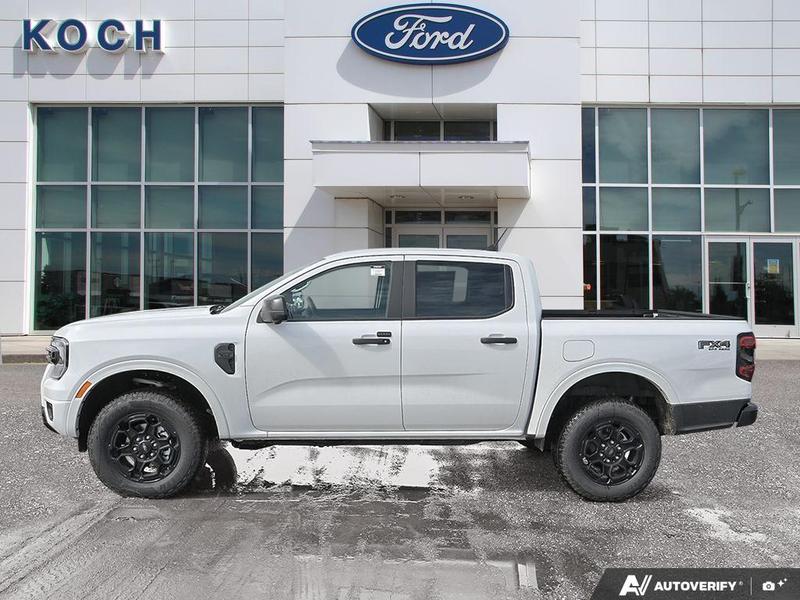 NEW 2026 Ford Ranger XLT - Oxford White Exterior / EBONY PREMIUM CLOTH Interior - $56,869 - Stock #E60297 - VIN 1FTER4HP7TLE04386 - Photo 3