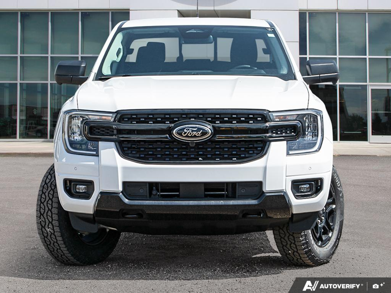 NEW 2026 Ford Ranger XLT - Oxford White Exterior / EBONY PREMIUM CLOTH Interior - $56,913 - Stock #E60297 - VIN 1FTER4HP7TLE04386 - Photo 2