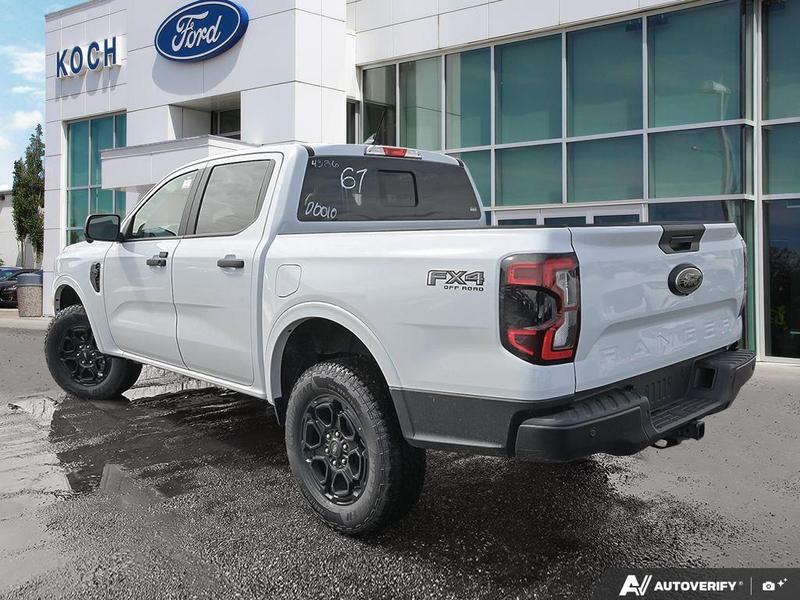 NEW 2026 Ford Ranger XLT - Oxford White Exterior / EBONY PREMIUM CLOTH Interior - $56,869 - Stock #E60297 - VIN 1FTER4HP7TLE04386 - Photo 4