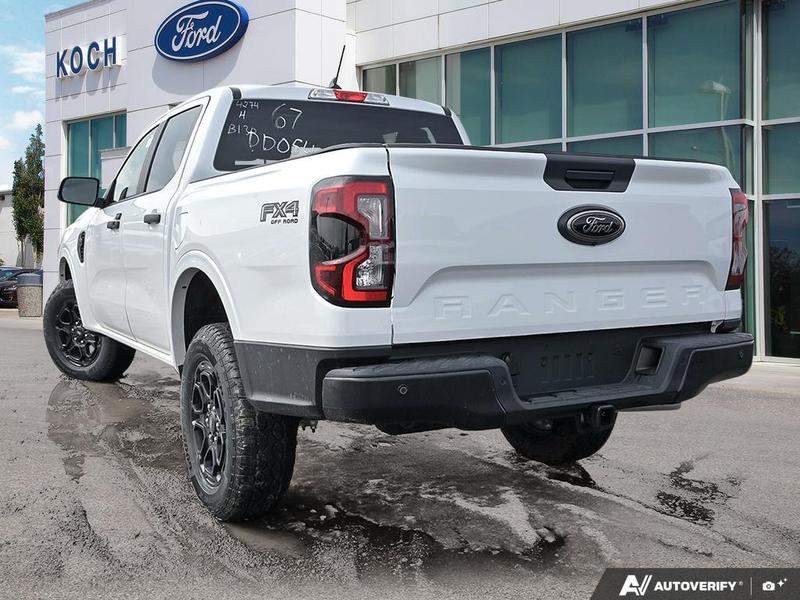 NEW 2026 Ford Ranger XLT - Oxford White Exterior / EBONY PREMIUM CLOTH Interior - $51,819 - Stock #E60294 - VIN 1FTER4HH6TLE04274 - Photo 4