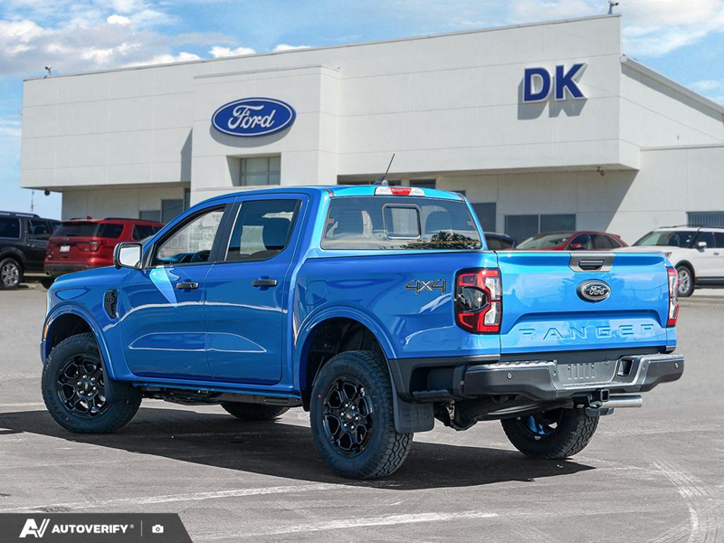 NEW 2026 Ford Ranger XLT - Velocity Blue Metallic Exterior / EBONY PREMIUM CLOTH Interior - $54,185 - Stock #D60613 - VIN 1FTER4HH0TLE29901 - Photo 4