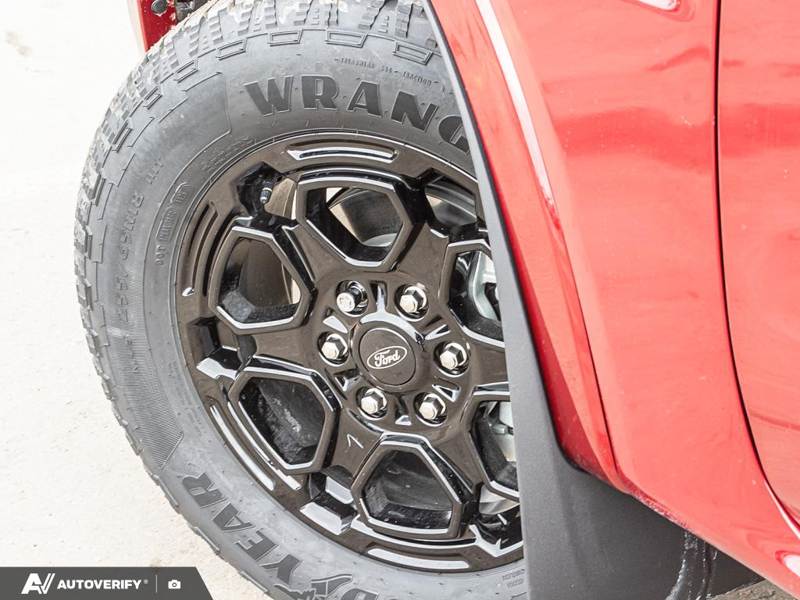 NEW 2026 Ford Ranger XLT - Ruby Red Tri-coat Metallic Exterior / EBONY PREMIUM CLOTH Interior - $56,083 - Stock #D60201 - VIN 1FTER4HH2TLE03526 - Photo 6
