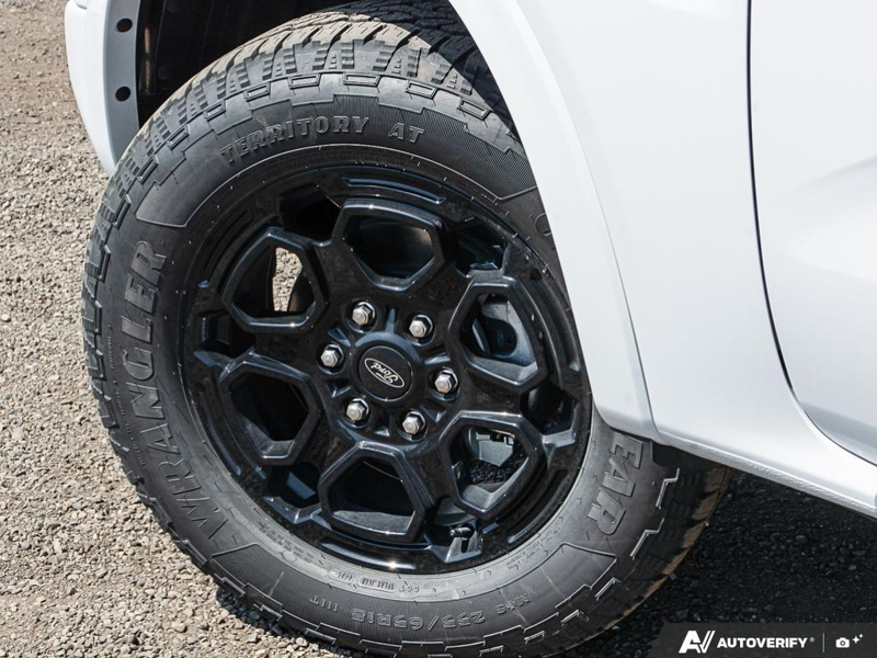 NEW 2026 Ford Ranger XLT - Oxford White Exterior / EBONY PREMIUM CLOTH Interior - $56,913 - Stock #E60309 - VIN 1FTER4HP2TLE04344 - Photo 6